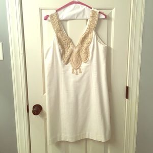 White and gold Lilly dress